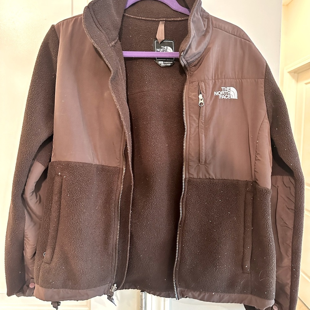 North face jacket. Worn in - but does the job in keeping you warm.
